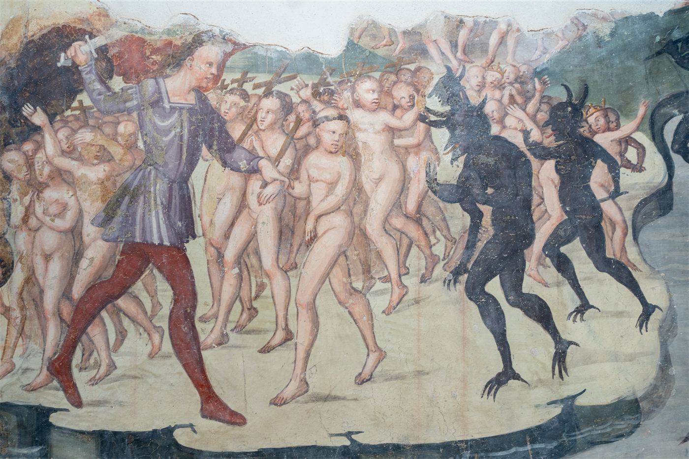 Affresco con un corteo di dannati nudi spinti da diavoli neri con zampe artigliate